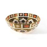 A Royal Crown Derby octagonal bowl decorated in the 'Old Imari' 1128 pattern on a white base with a