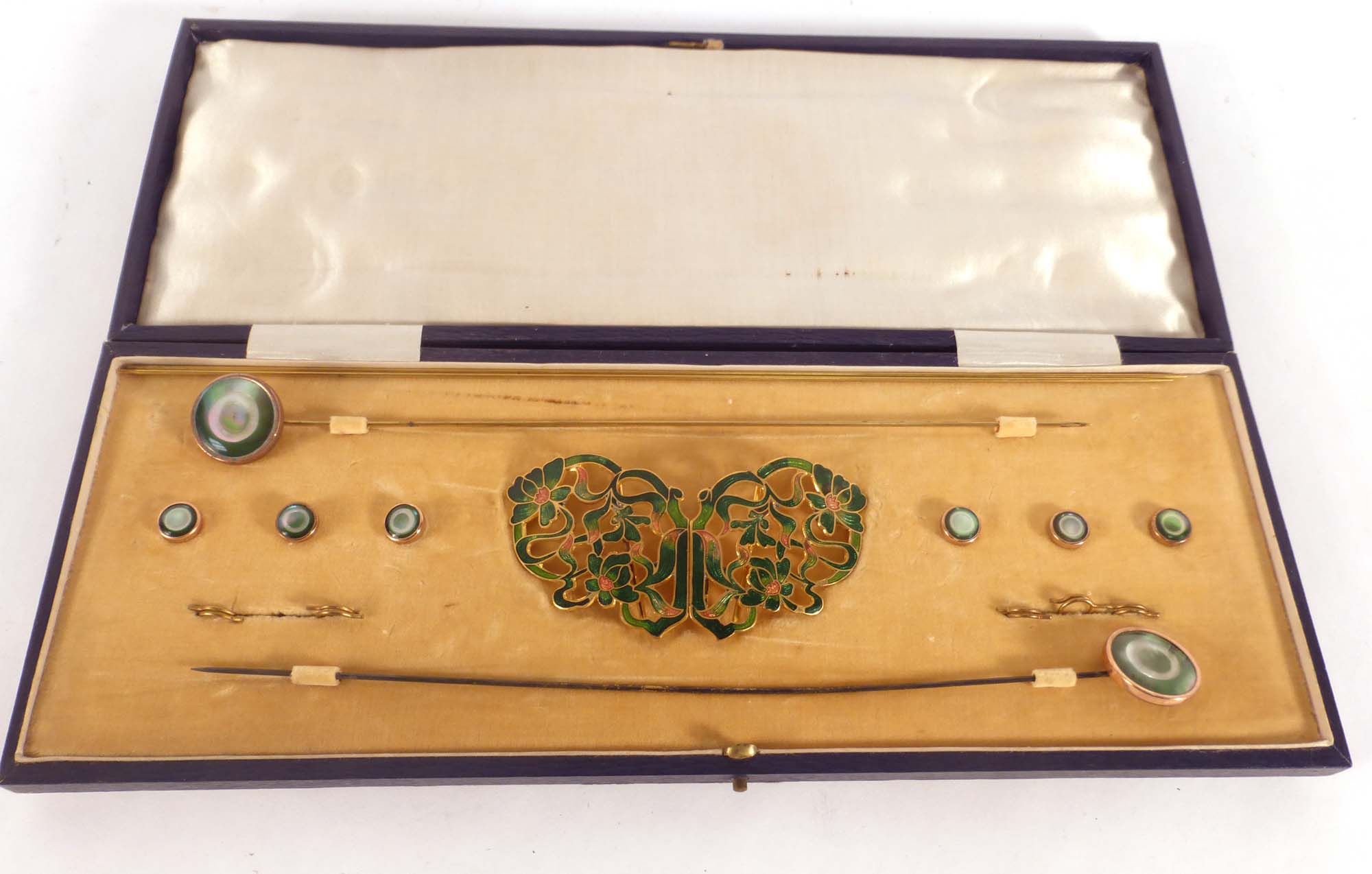 A cased gilt metal and green enamelled dress set comprising a buckle, - Image 2 of 2