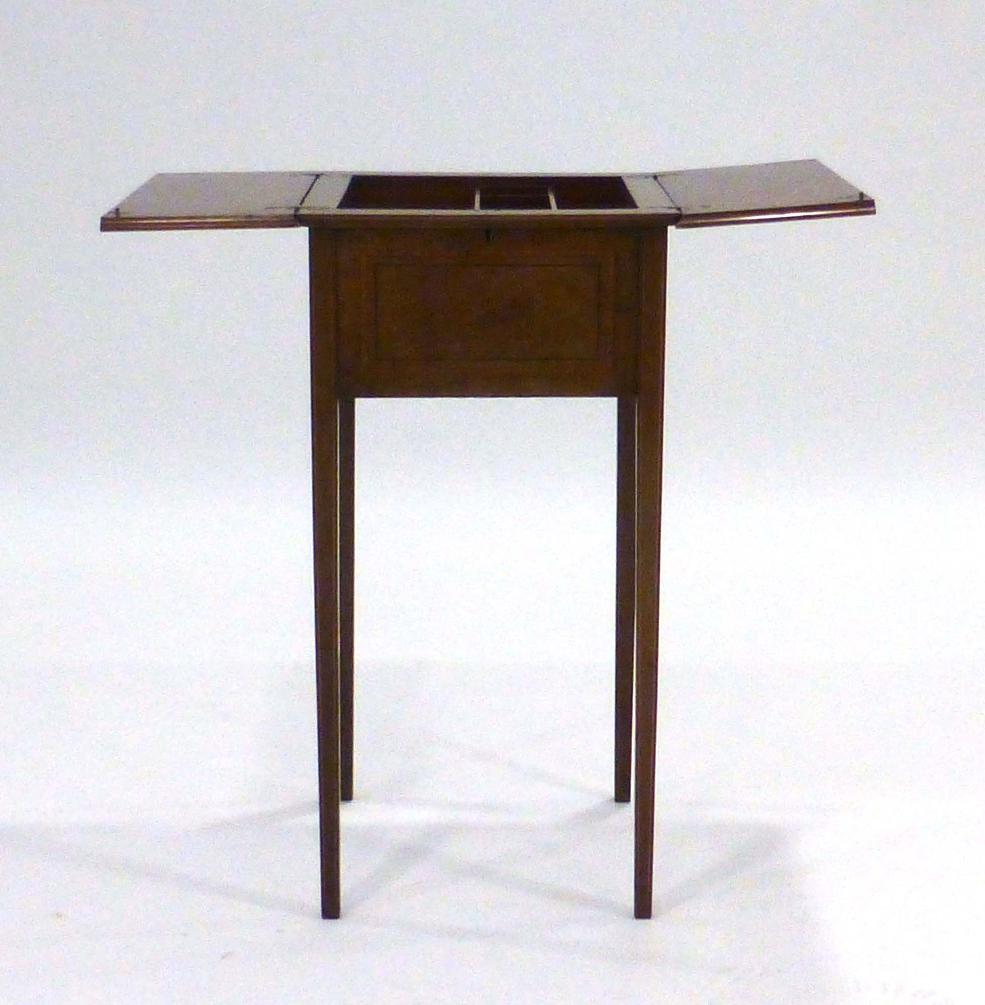 An Edwardian mahogany and strung sewing table with a concertina top on square tapering legs, w.