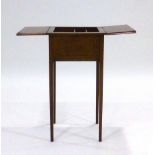 An Edwardian mahogany and strung sewing table with a concertina top on square tapering legs, w.