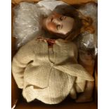 An Armand Marseille bisque headed doll with painted features,