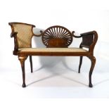 An Edwardian mahogany, strung, inlaid and upholstered seat, the back rest of fan-form,