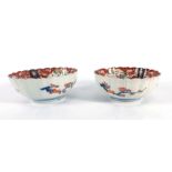 A pair of late 19th/early 20th century Chinese bowls of scalloped form typically decorated in the