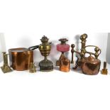 A group of Victorian brass and copper wares including a pair of fire dogs,