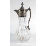 A 19th century-style claret jug, the silver plated mounts of naturalist design, h.