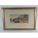 19th century School, a figure fishing in a river beside buildings, watercolour,