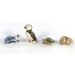 A Royal Crown Derby paperweight modelled as a terrapin together with others modelled as a puffin,