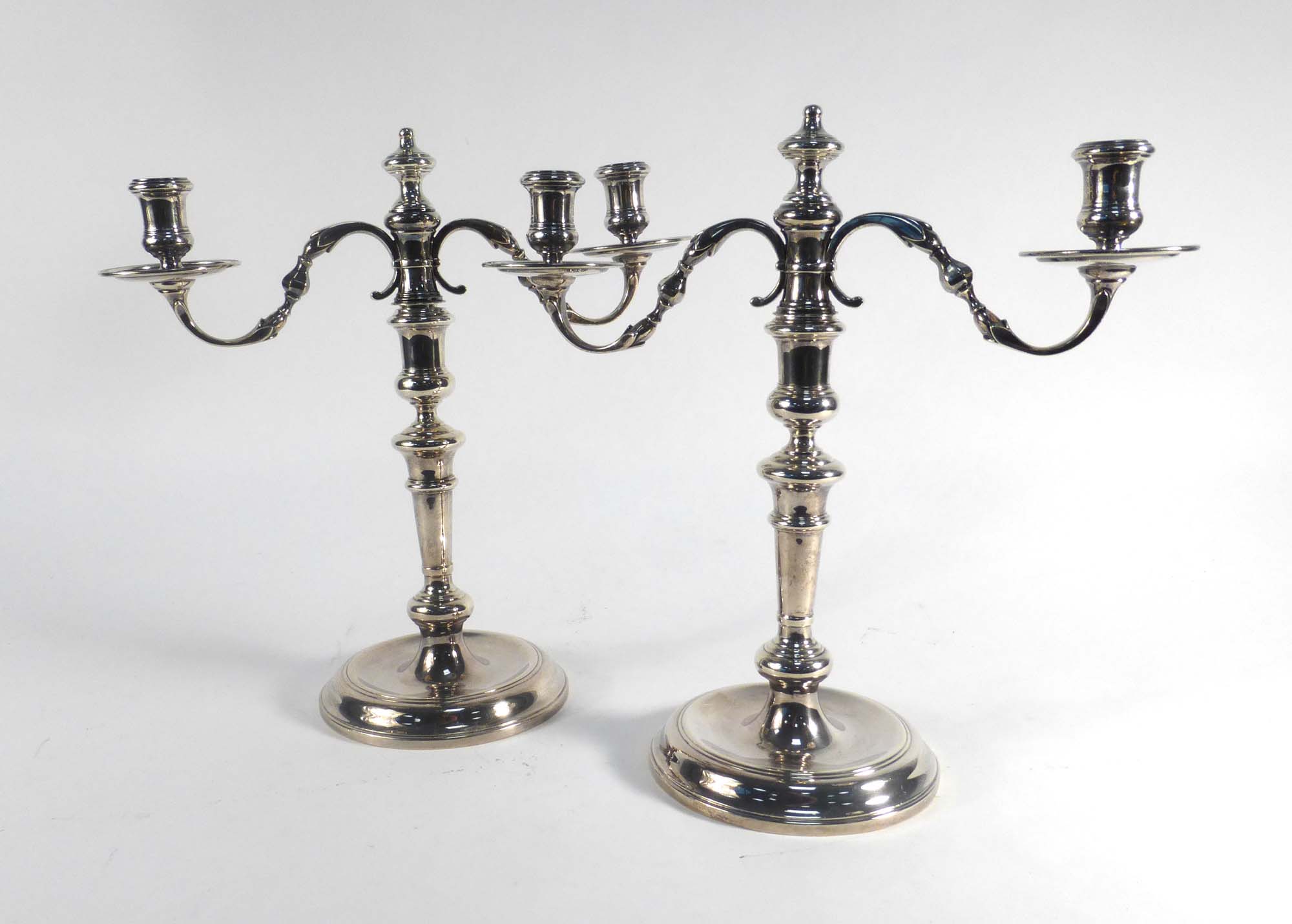 A pair of 18th century-style two branch candlesticks,
