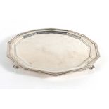 An early 20th century silver salver of twelve sided form on four stepped feet, Ollivant & Botsford,