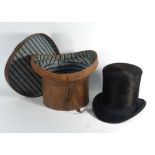 A felttop hat and leather box,
