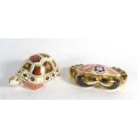 A Royal Crown Derby paperweight modelled as a crab together with another modelled as a turtle,
