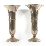 A pair of early 20th century silver vases of flared form, maker WN Ltd. Birmingham 1922, h.
