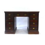 A Victorian mahogany twin pedestal desk with an arrangement of nine drawers on plinth bases, l.
