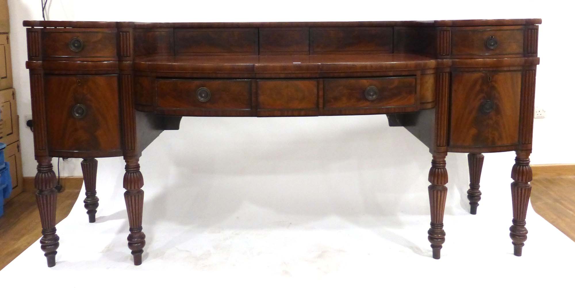 A George III Scottish mahogany and ebony line strung sideboard,