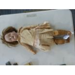 An Armand Marseille bisque headed doll with painted features,