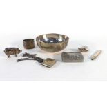 A mixed parcel of silver comprising a shell shaped caddy spoon, a vesta case, a napkin ring,