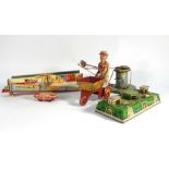 A mixed group of tinplate clockwork toys including 'The Big Dipper', 'Sam the Gardener',