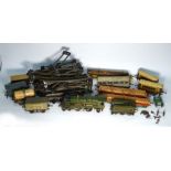An O gauge 'Caerphilly Castle' tinplate loco, together with various coaches,