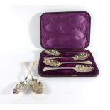 A fitted cased containing two pairs of silver berry spoons, together with two further berry spoons,