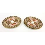 A set of twelve Royal Crown Derby sandwich plates decorated in the traditional Imari 2451 pattern,