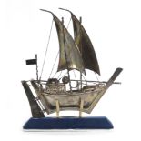 An early 20th century metalware model of a two master vessel, h.