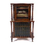 A 19th century walnut, strung and brass mounted music cabinet,