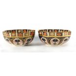 A pair of Royal Crown Derby octagonal bowls decorated in the 'Old Imari' 1128 pattern on white
