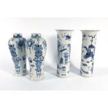 A pair of late 19th/early 20th century Chinese blue and white vases of slender baluster form