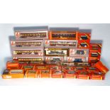 A group of OO gauge accessories including Lima coaches, Hornby Railways wagons and other items,