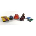 A mixed group of tinplate, clockwork and other vehicles including a Chad Valley saloon car,