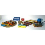 A mixed group of OO gauge trackside buildings, coaches, rolling stock,