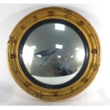 A 19th century giltwood and plaster cavetto wall mirror, d.