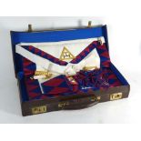 A leather case containing a Light & Boston Masonic apron together with some associated ephemera