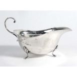 An early 20th century silver milk jug of typical form, maker S Ltd.