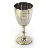 An Edwardian silver goblet of typical plain form, maker BR, Birmingham 1900, h. 20.