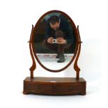 A Regency-style mahogany swing mirror on bow fronted base with two frieze drawers, w.