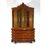 An 18th century Dutch walnut and marquetry breakfront bookcase,