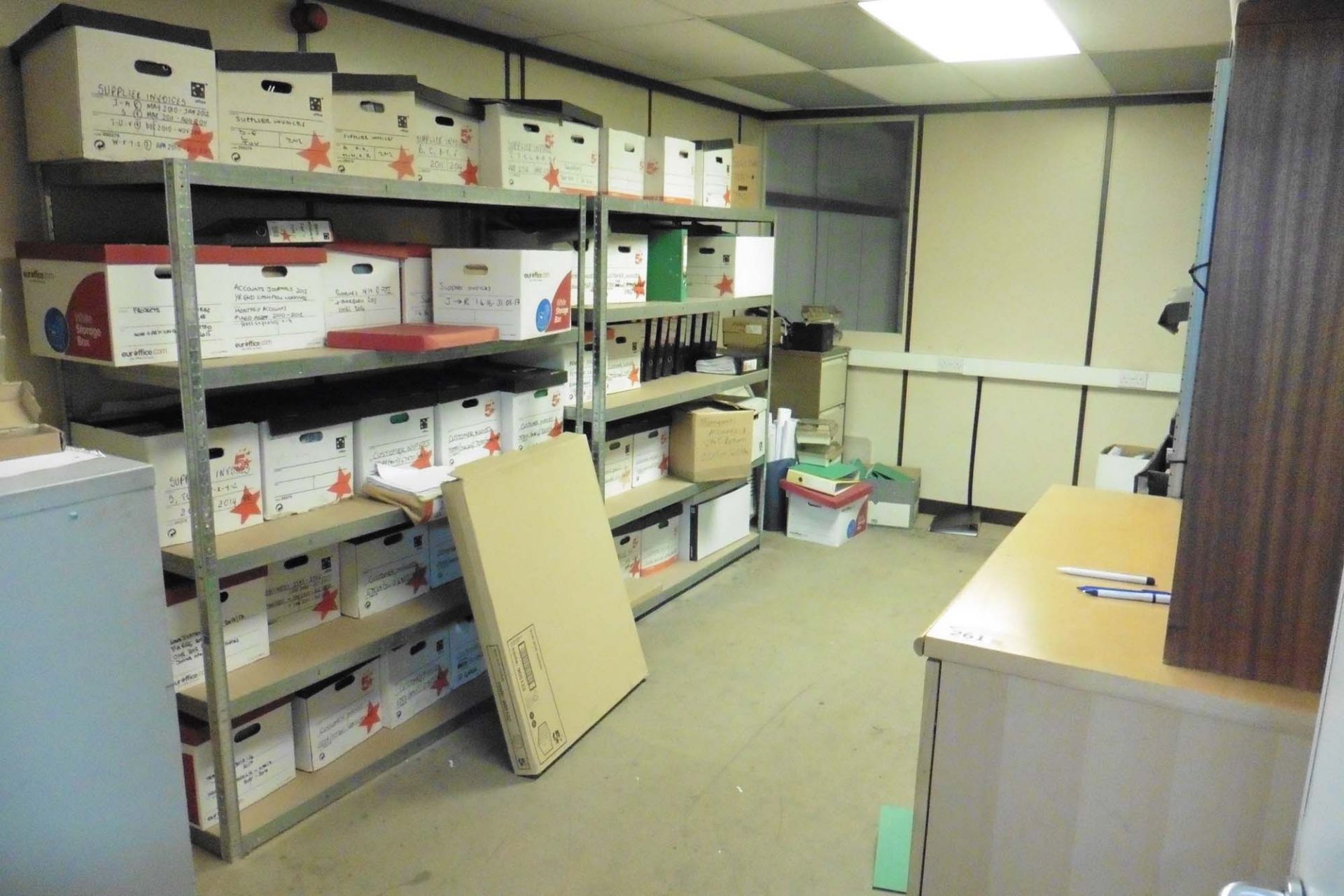 Furnishings in the archive store comprising 6 bays of shelf racking, 3x 4 drawer filing cabinets and