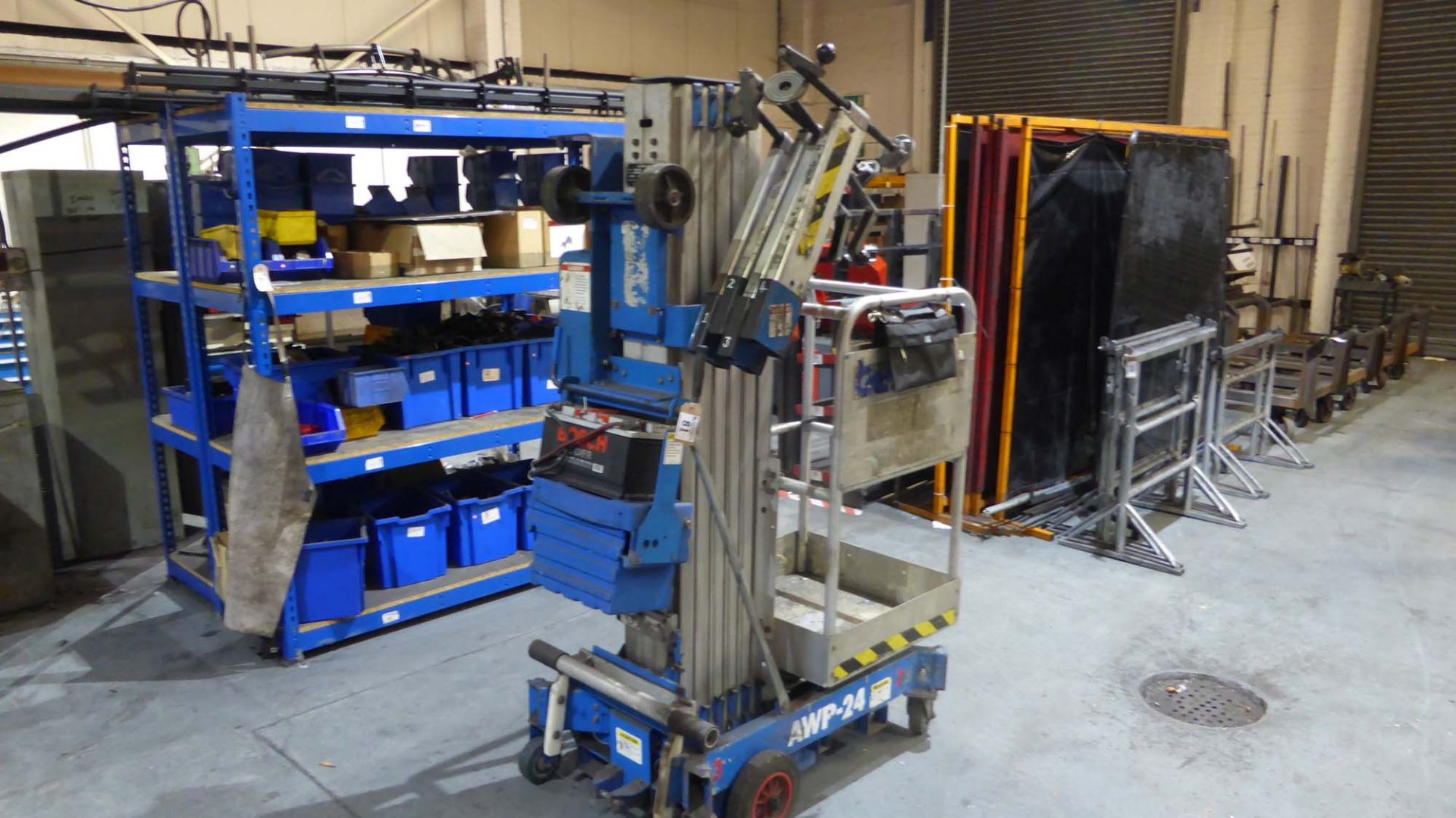 Genie 300lb platform lift height approx. 24ft with pedestrian cradle, stabilisers, 12v battery