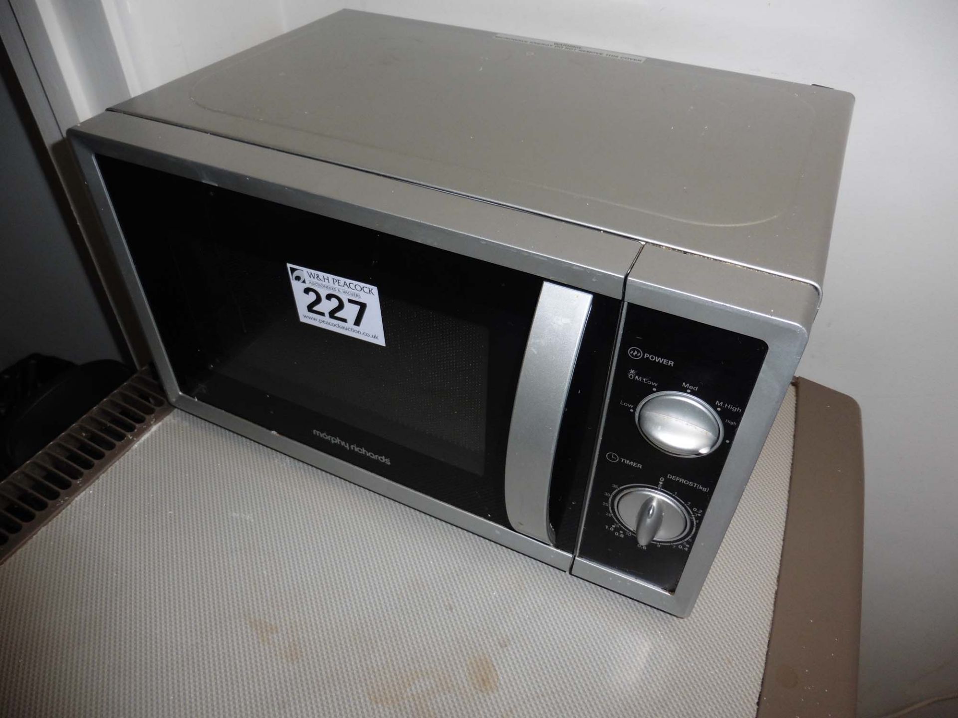 Contents of kitchen including Hotpoint refrigerator, Morphy Richards microwave and kettle