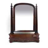 A 19th century mahogany mirror,