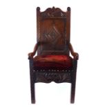 An 19th century and later carved oak 'Wainscott'-type hall chair