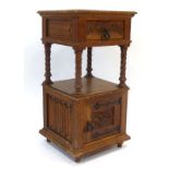 A late 19th century oak cupboard, the single drawer over a gallery and solid door, w.