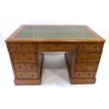 A Victorian oak twin pedestal desk,