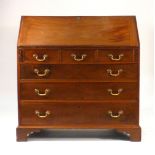 A George III mahogany bureau,