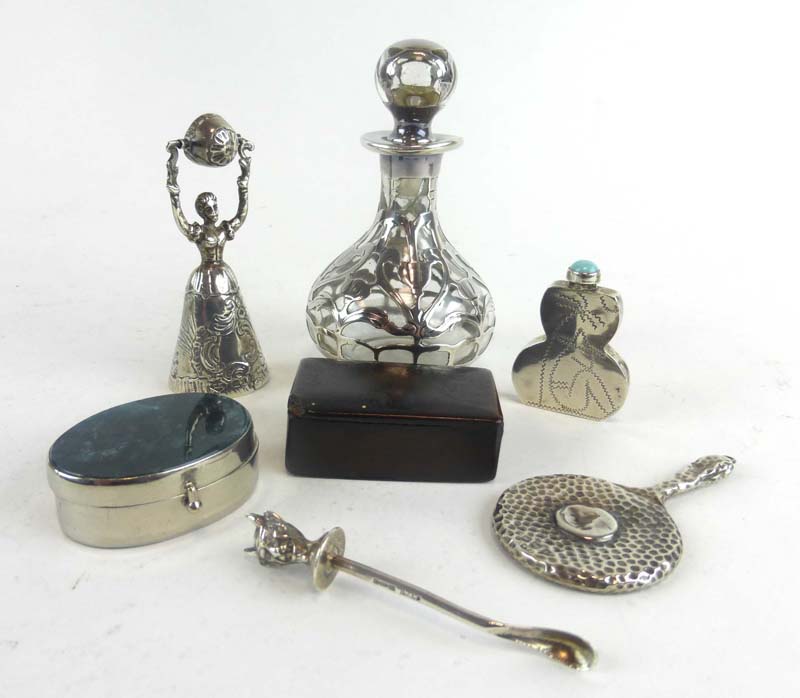 A mixed parcel of items consisting an metalware overlaid scent bottle,