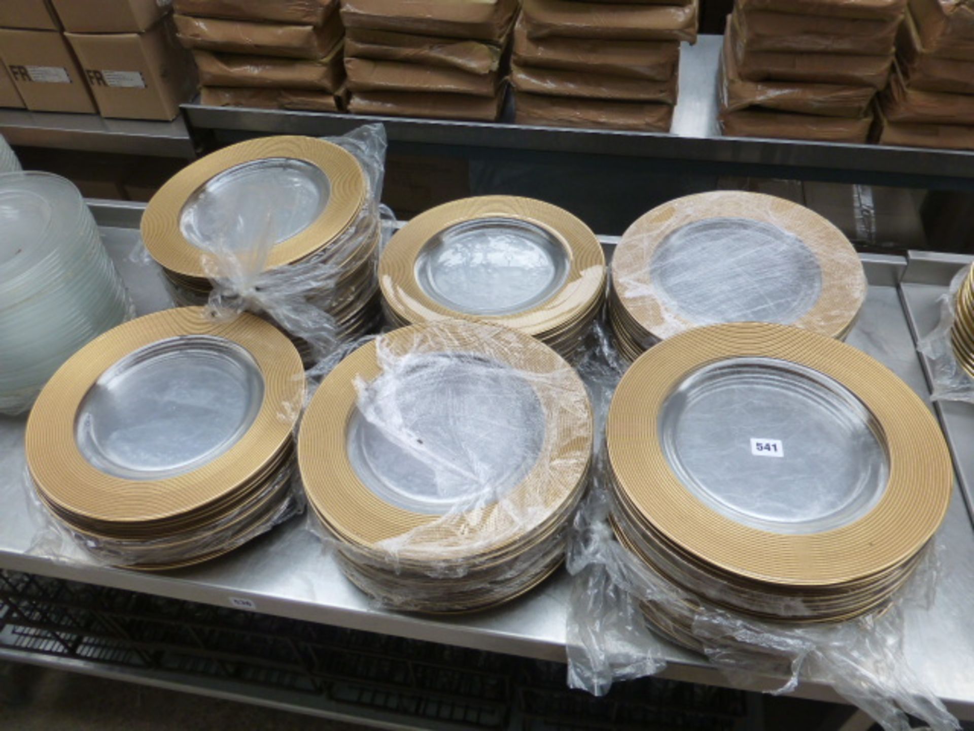 Approx. 80 13'' clear glass plates with gold rims