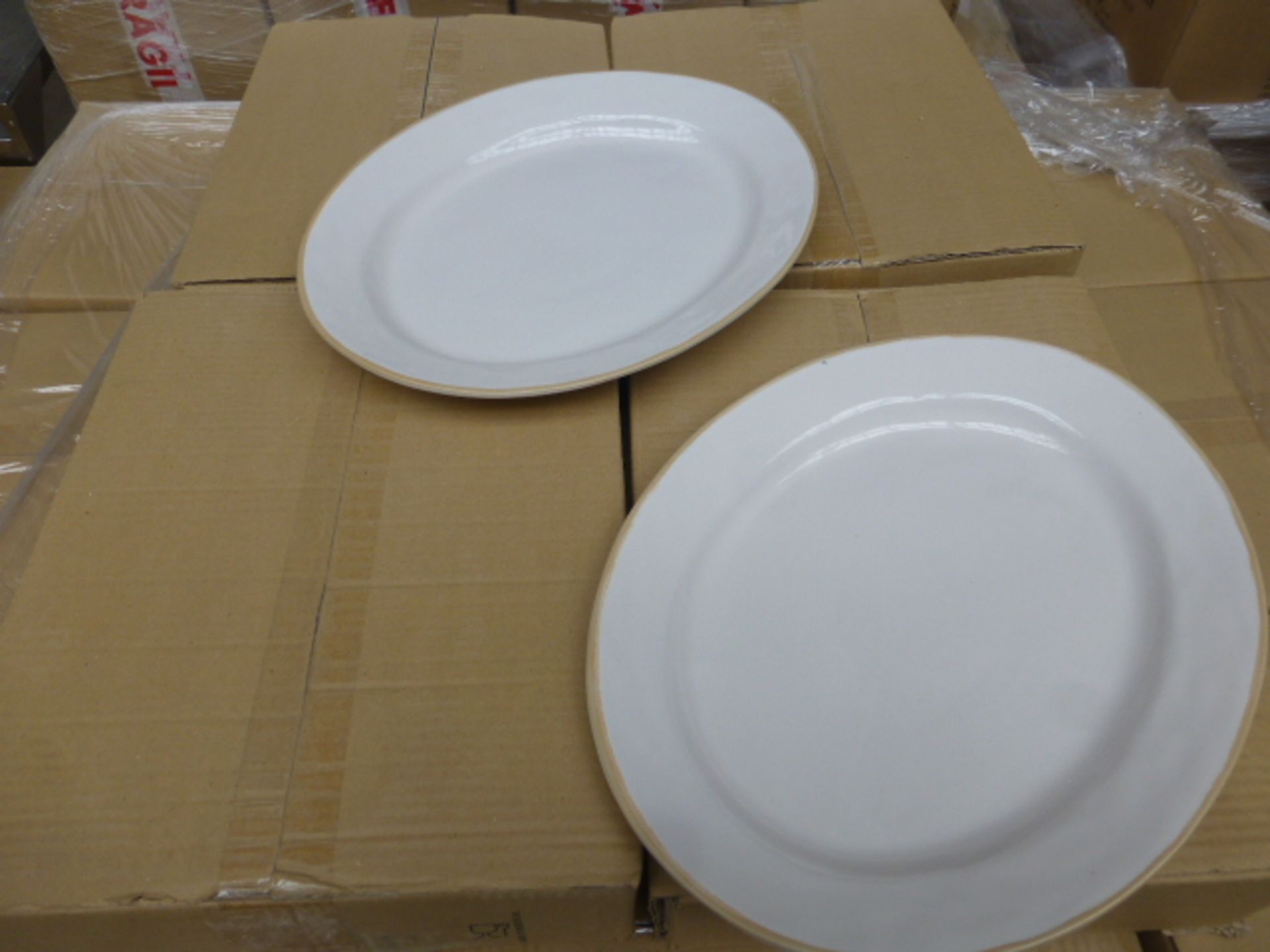 10 boxes of 38cm oval stone ware plates (40 in total)
