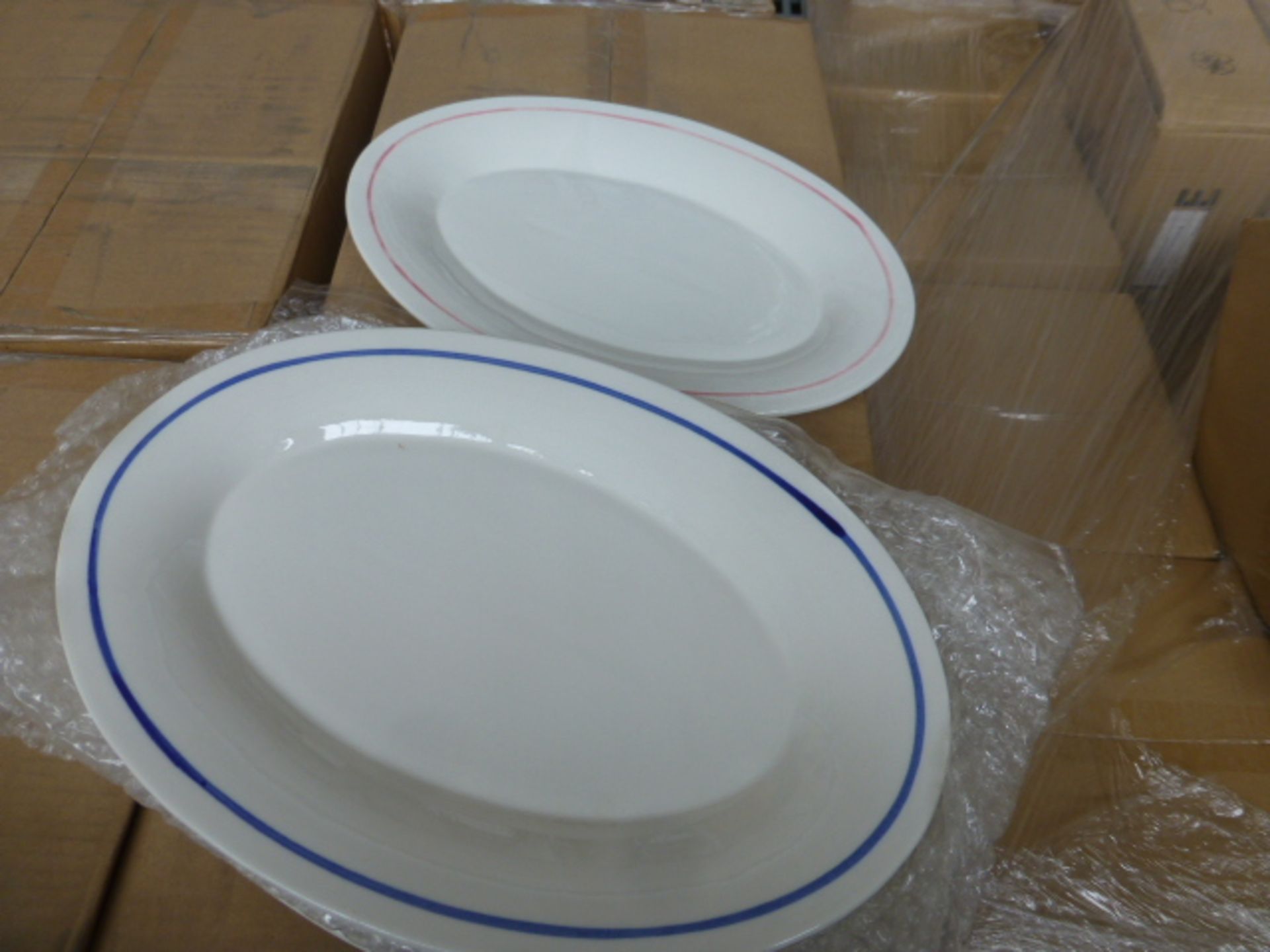 2 boxes of 37cm stone ware oval plates (24 in total)