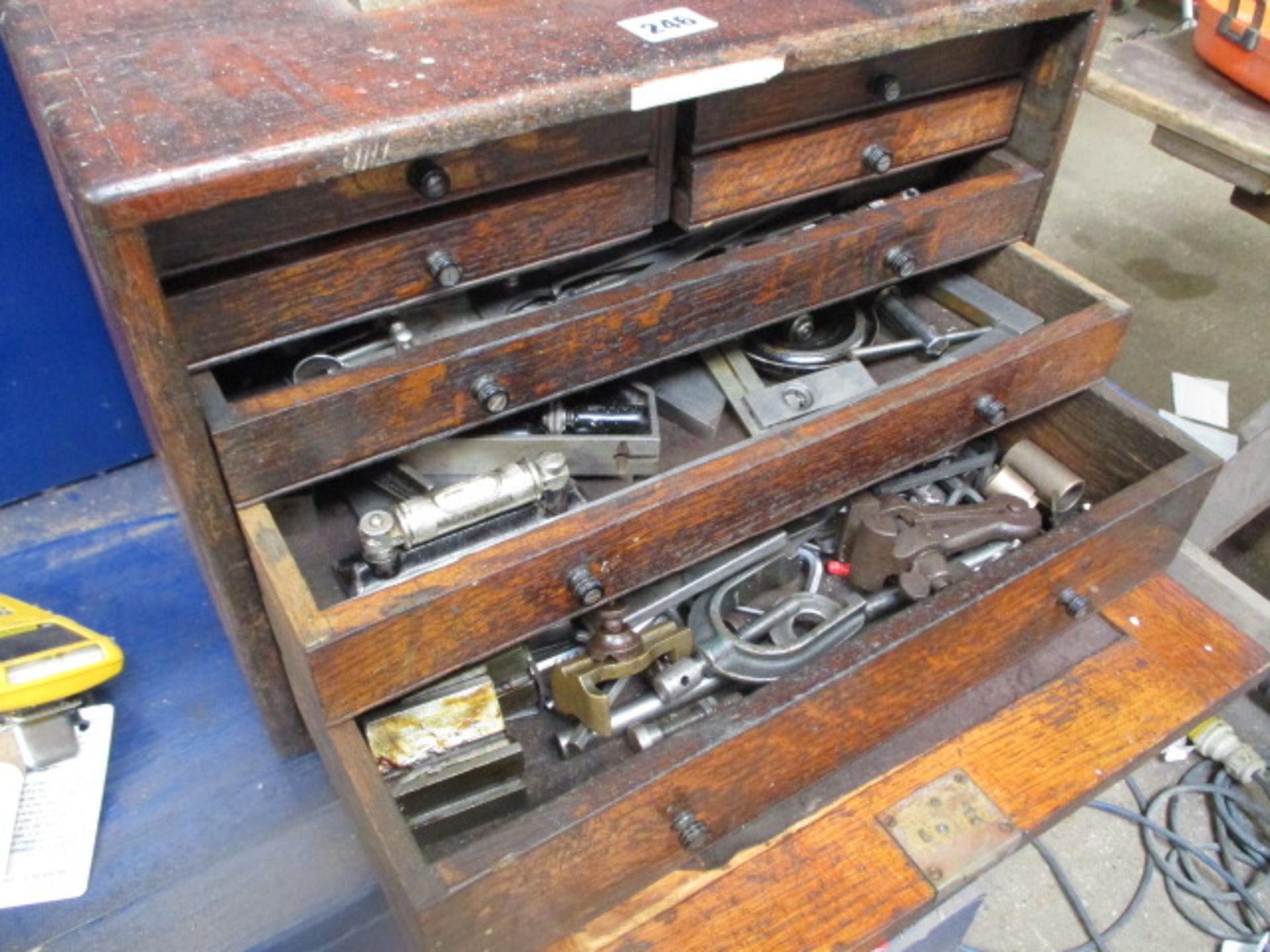 Wooden cased engineer's box incl. contents of allen keys, specialist vices, angle blocks, pullers,